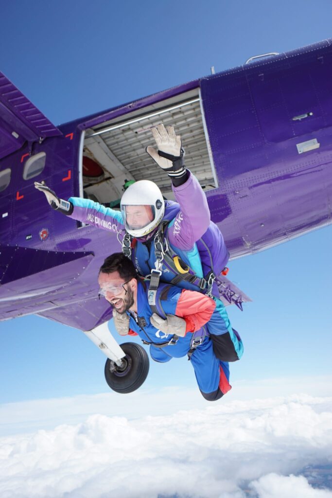 Founder of CHEER! - Joe Morrison, jumping out of a plane.